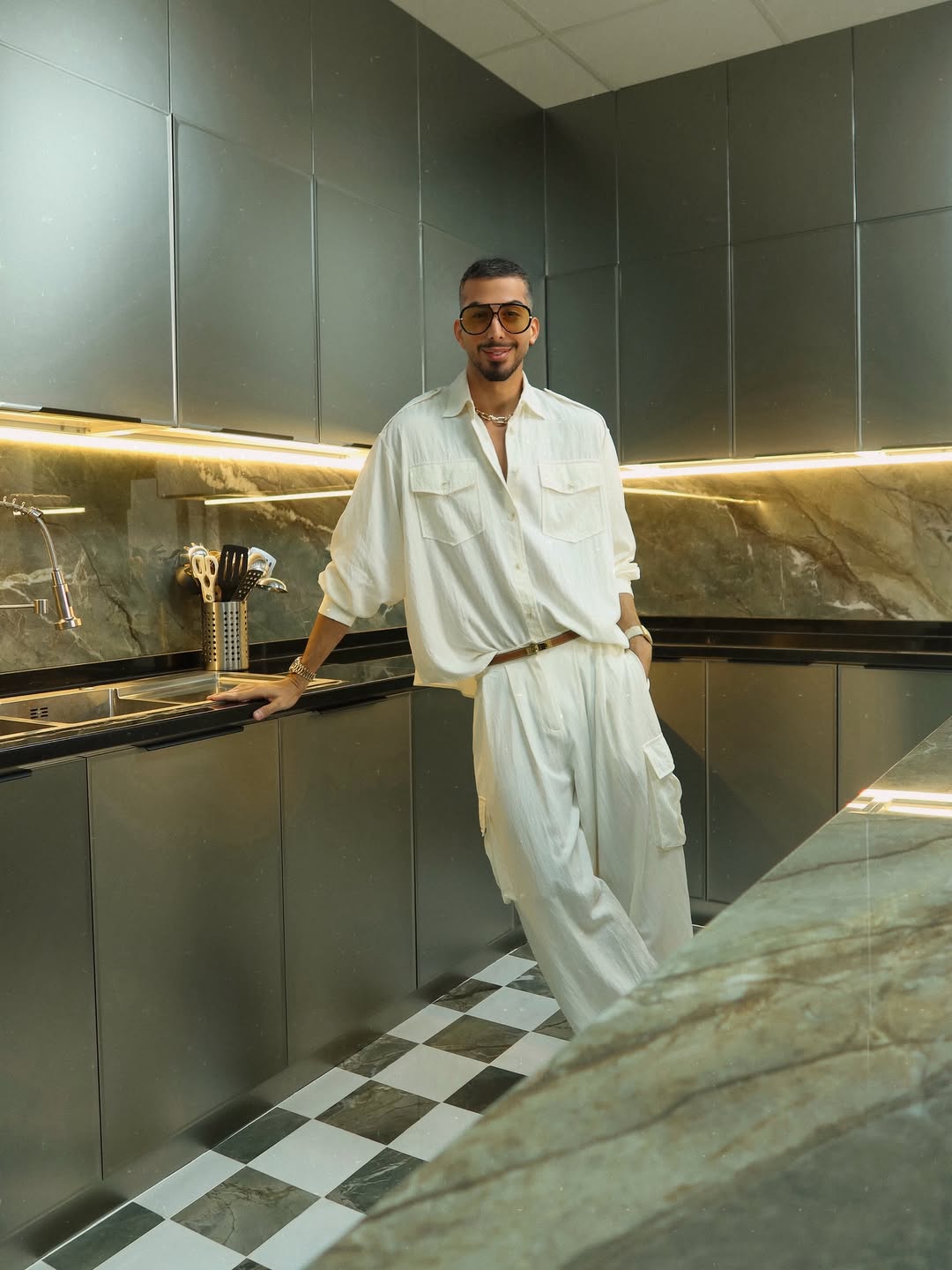 Man wearing light neutral bottoms
